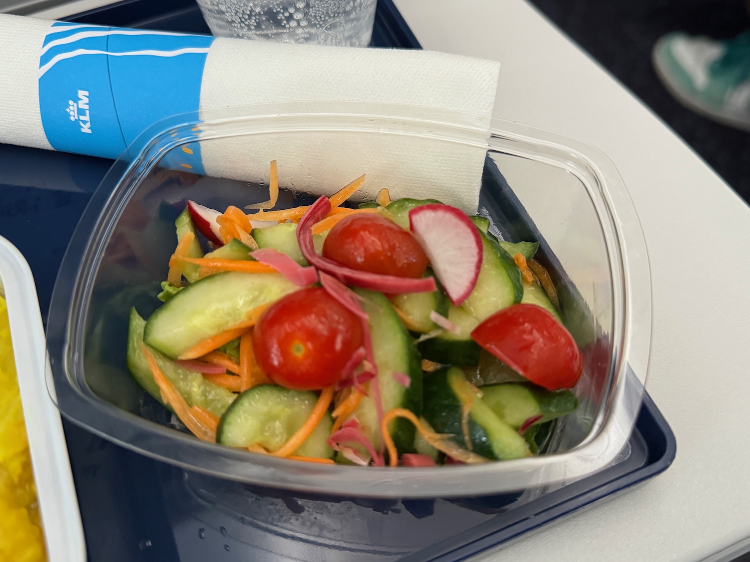 a salad in a plastic container