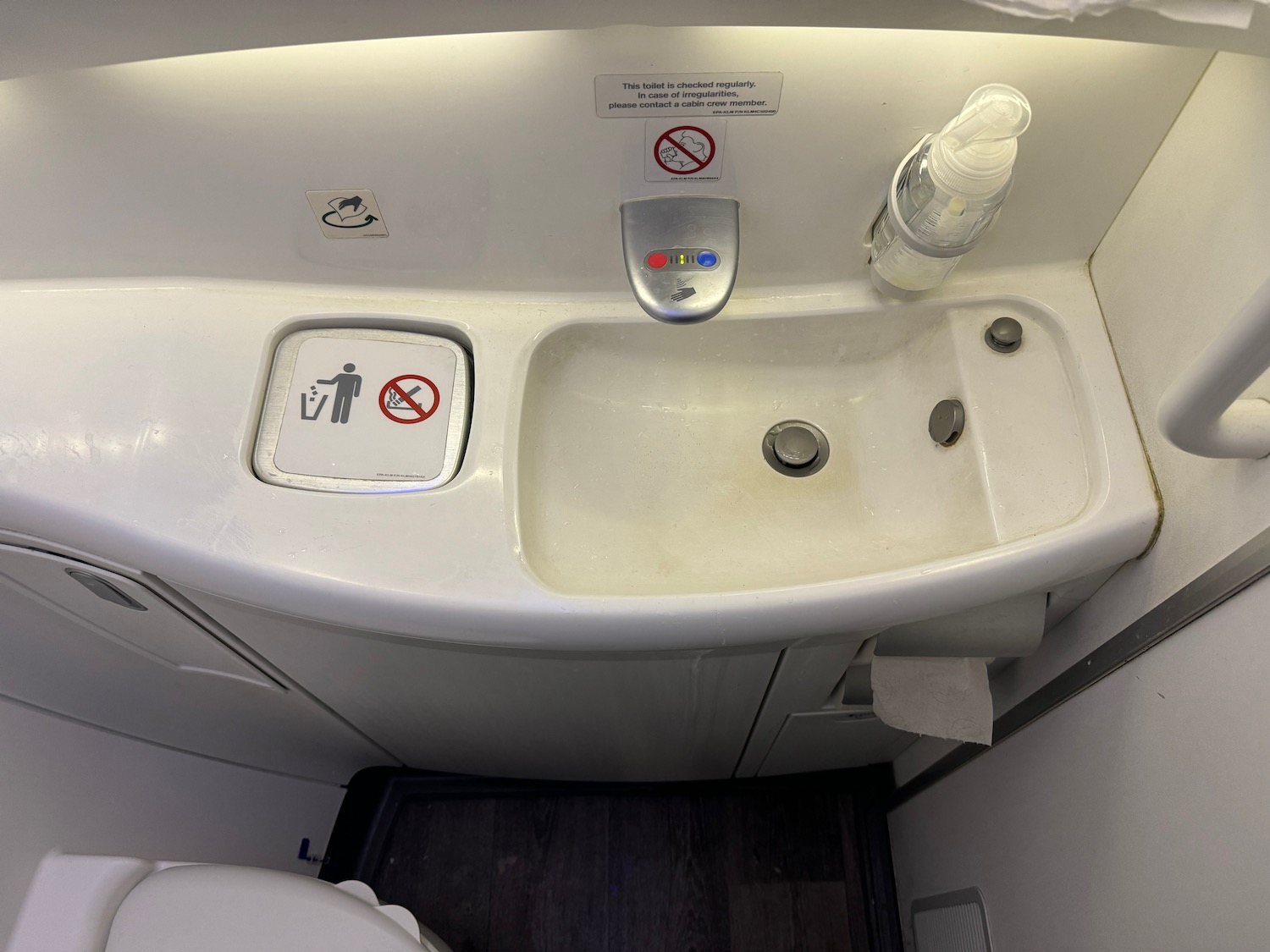 a sink and toilet in an airplane