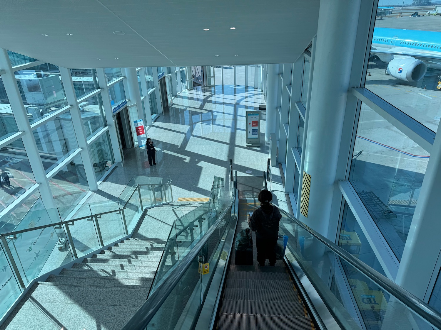 a person on an escalator