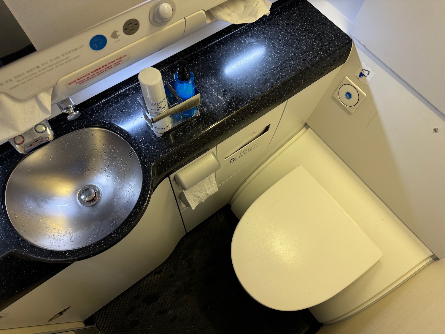 a sink and toilet in a bathroom