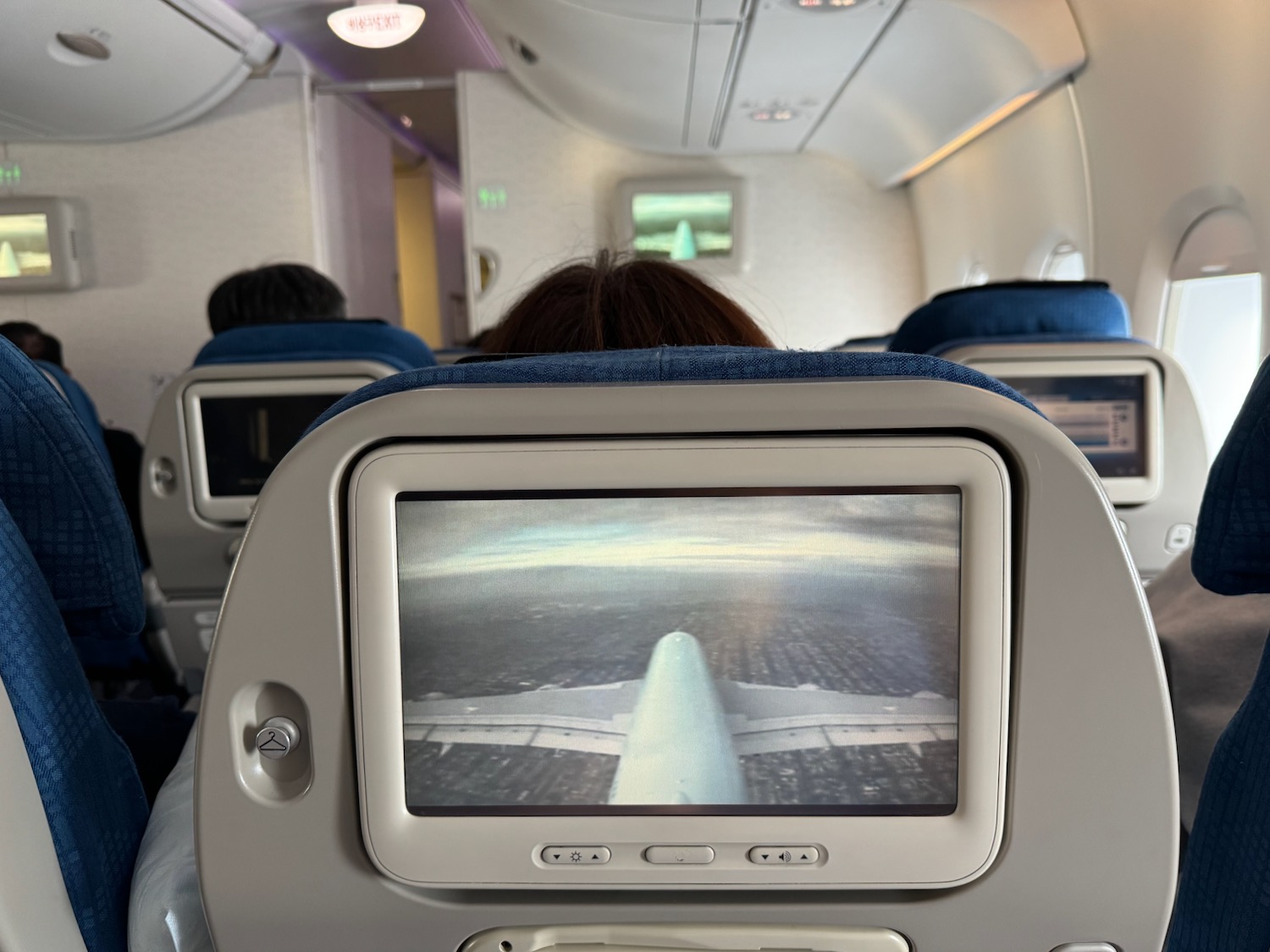 a screen on the back of an airplane