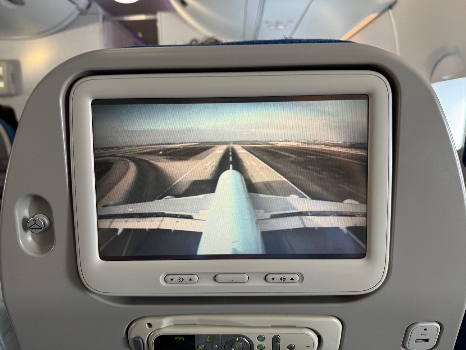 a screen on the back of an airplane