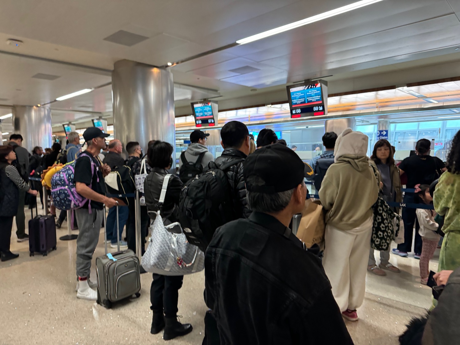 a group of people standing in a line