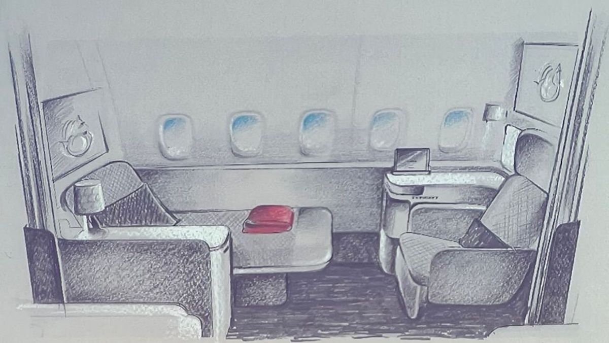 drawing of an airplane with a drawing of a chair and a table