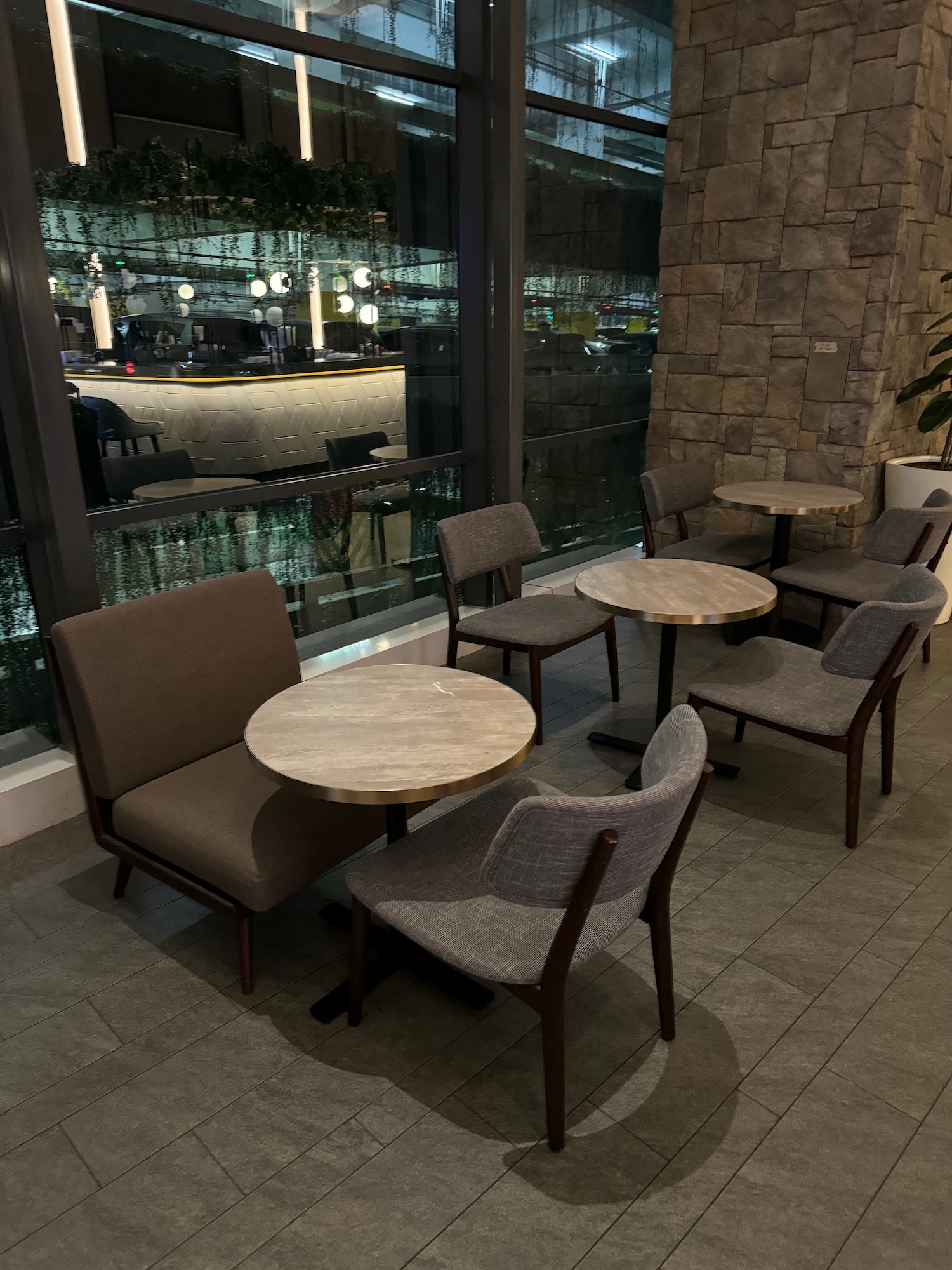 a group of tables and chairs in a room