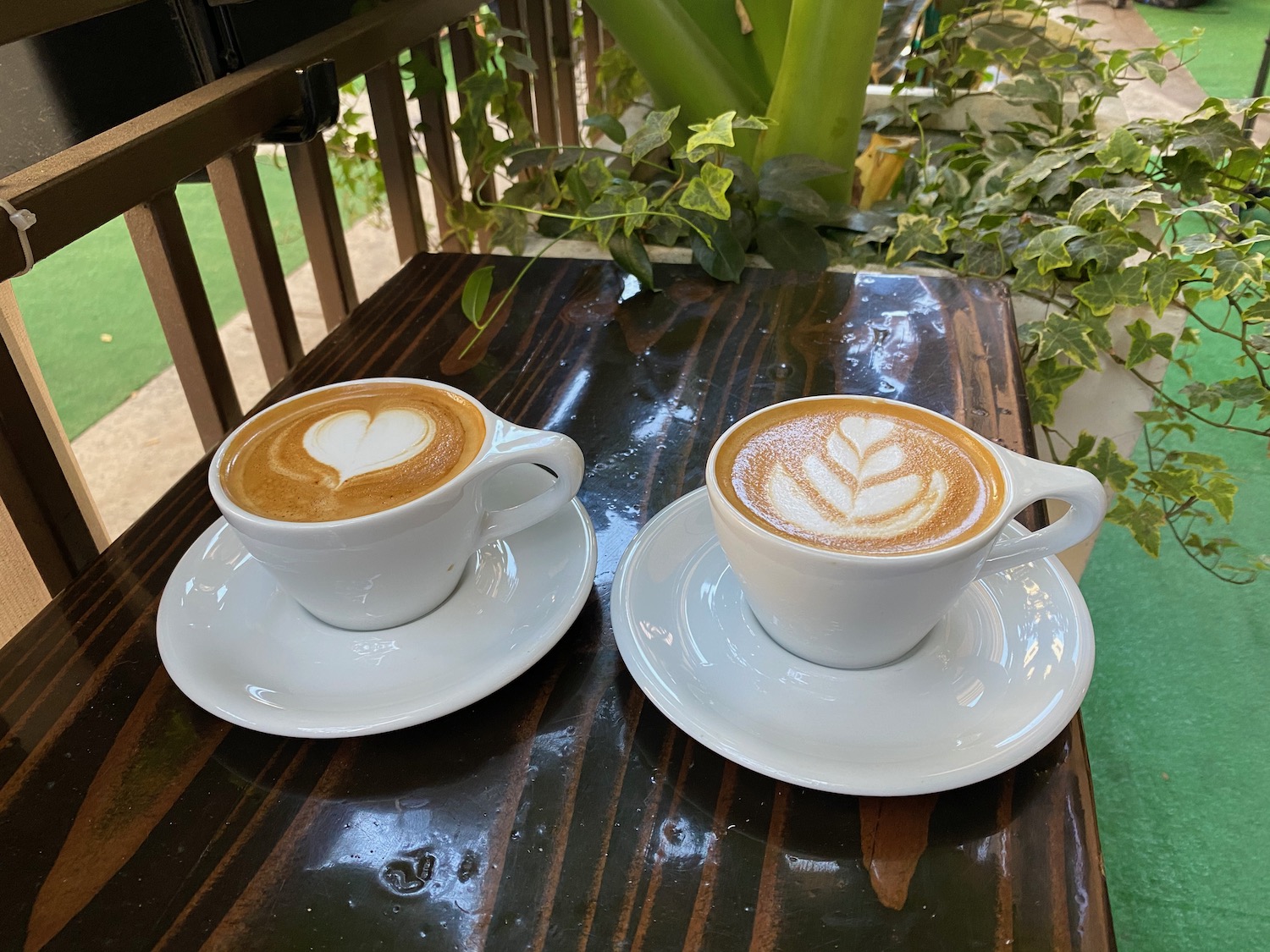 two cups of coffee on a table