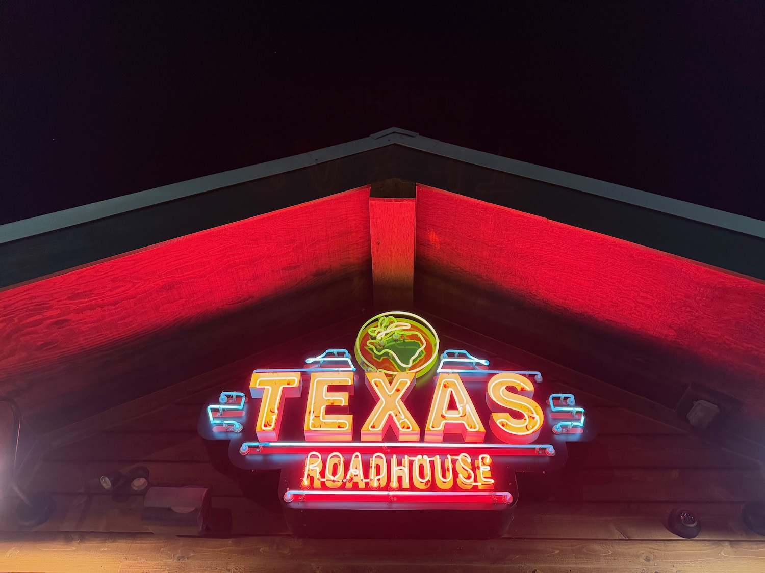 a neon sign on a building