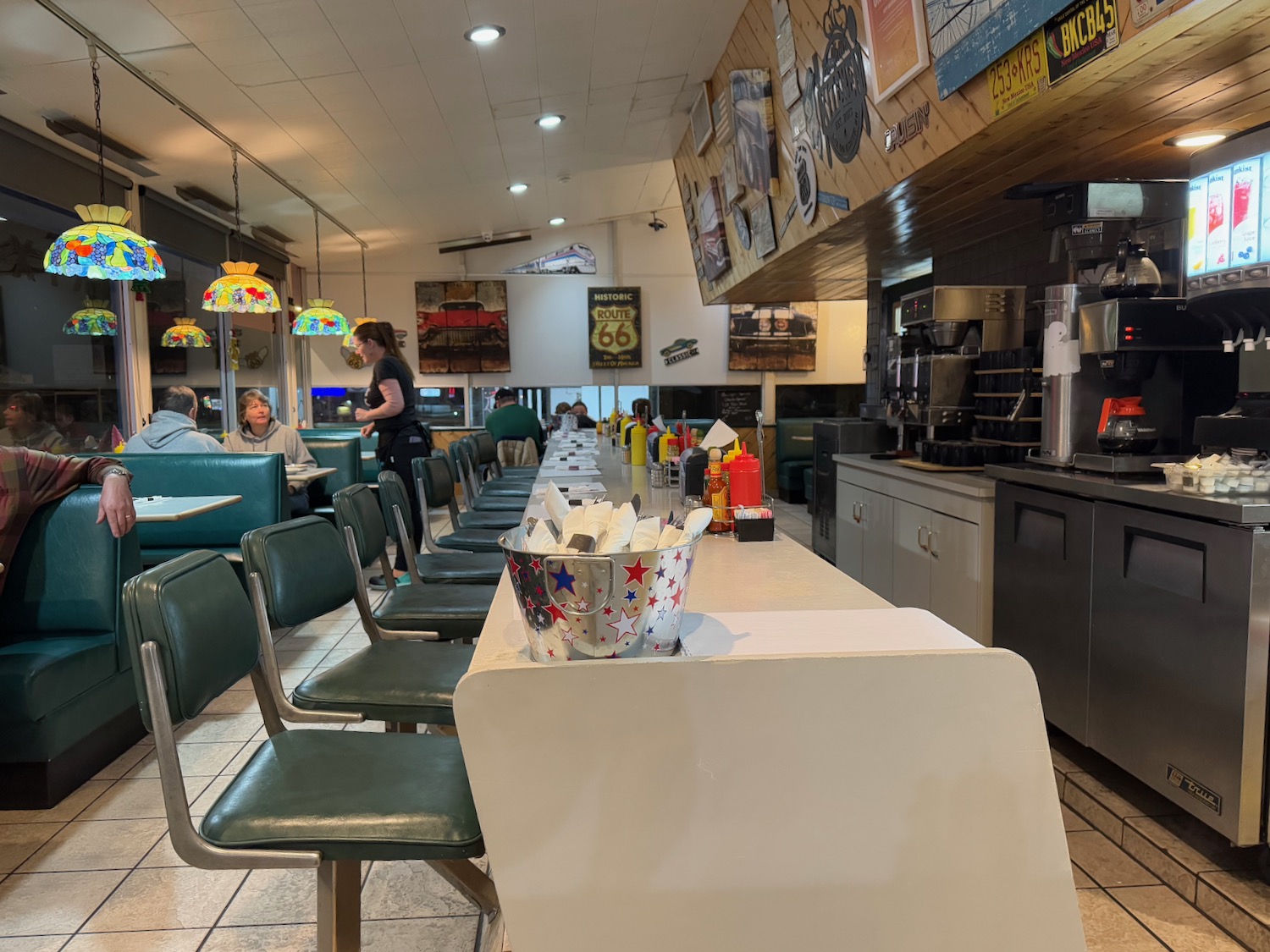 a restaurant with tables and chairs