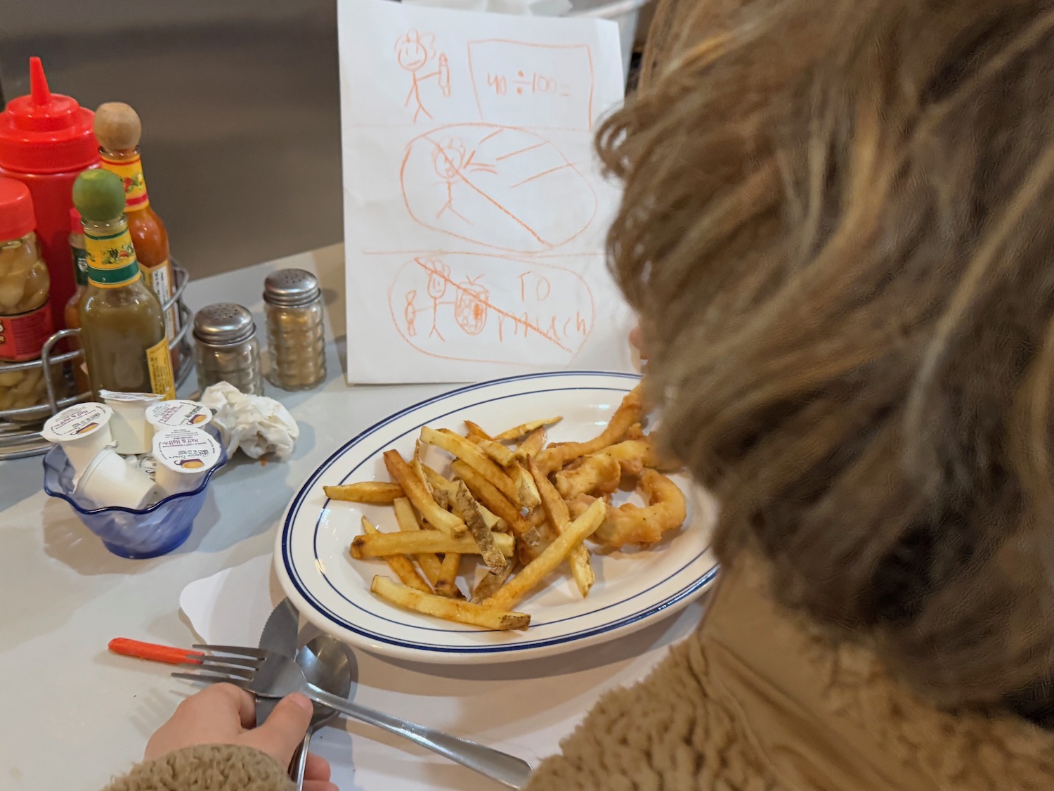 a person eating food on a table