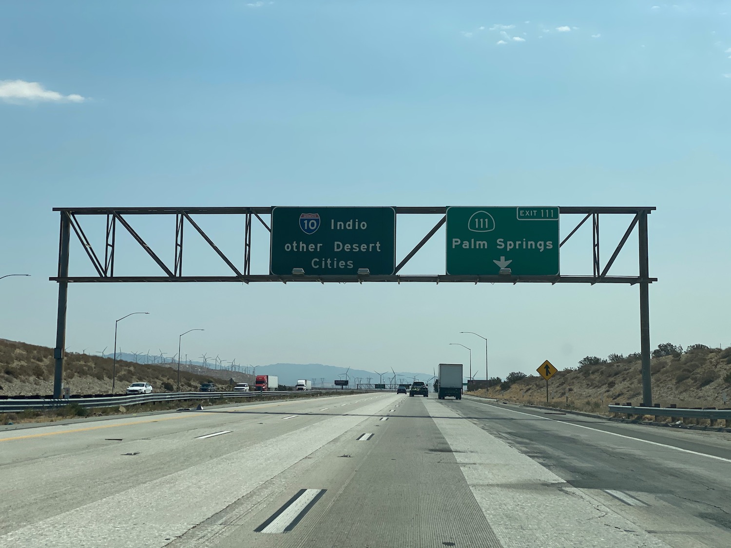 a road sign over a highway