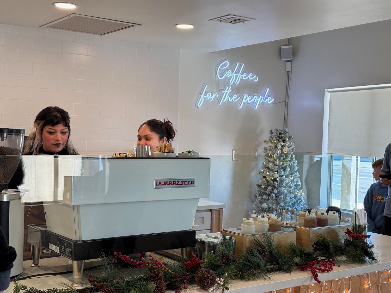 two women behind a counter