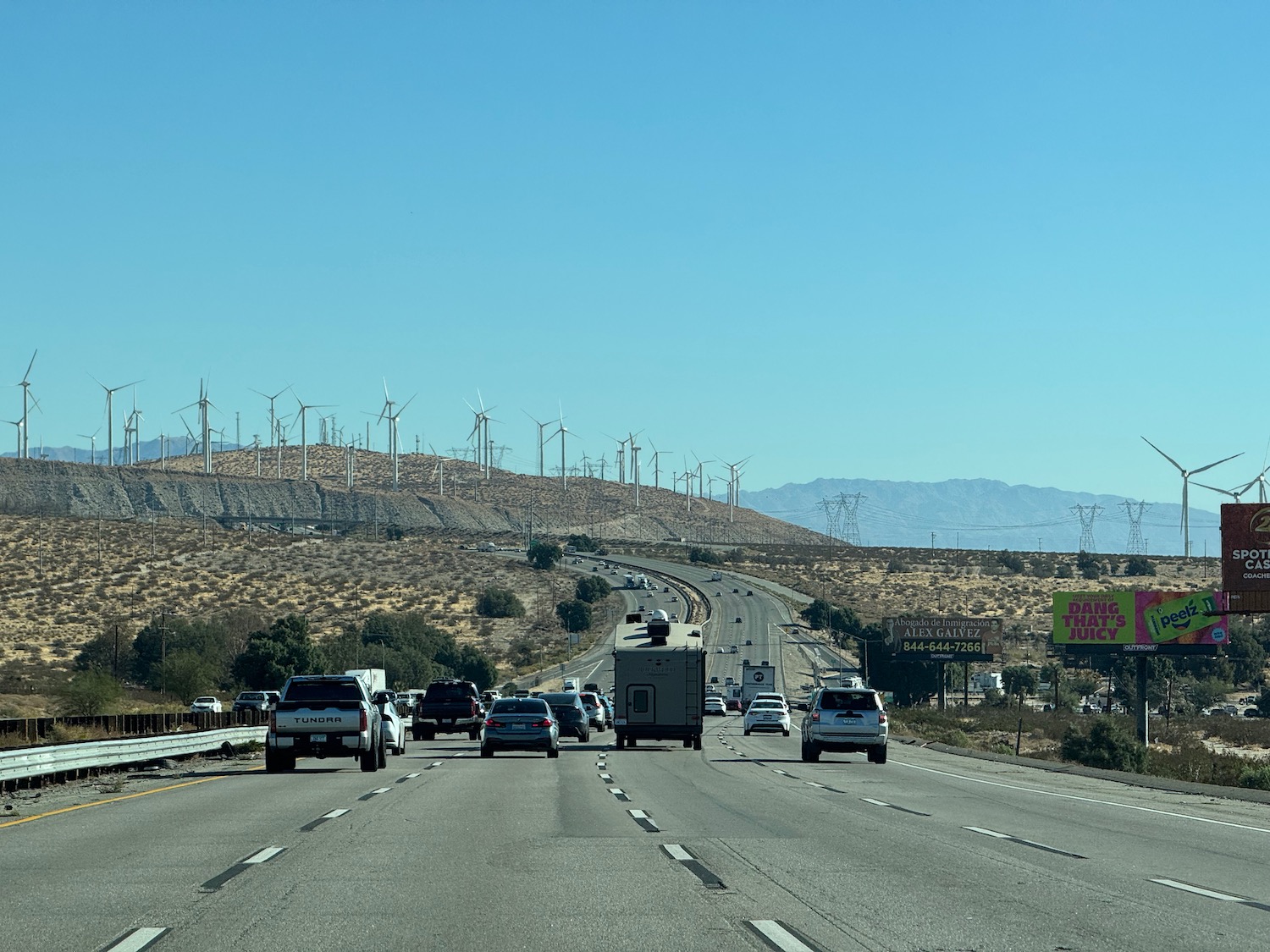 a highway with many cars on it