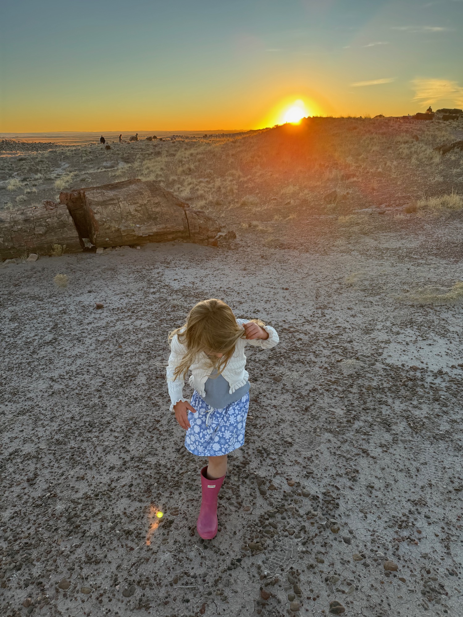 a girl walking in the desert