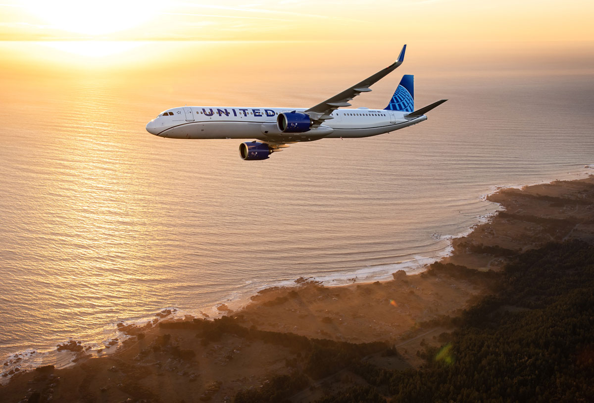 an airplane flying over a body of water