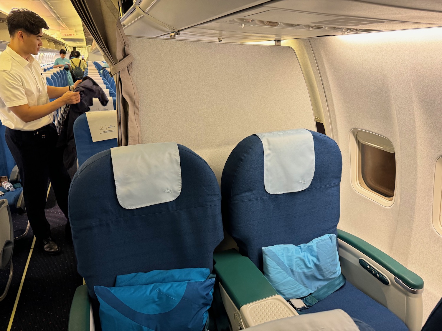 a person standing in the back of a plane