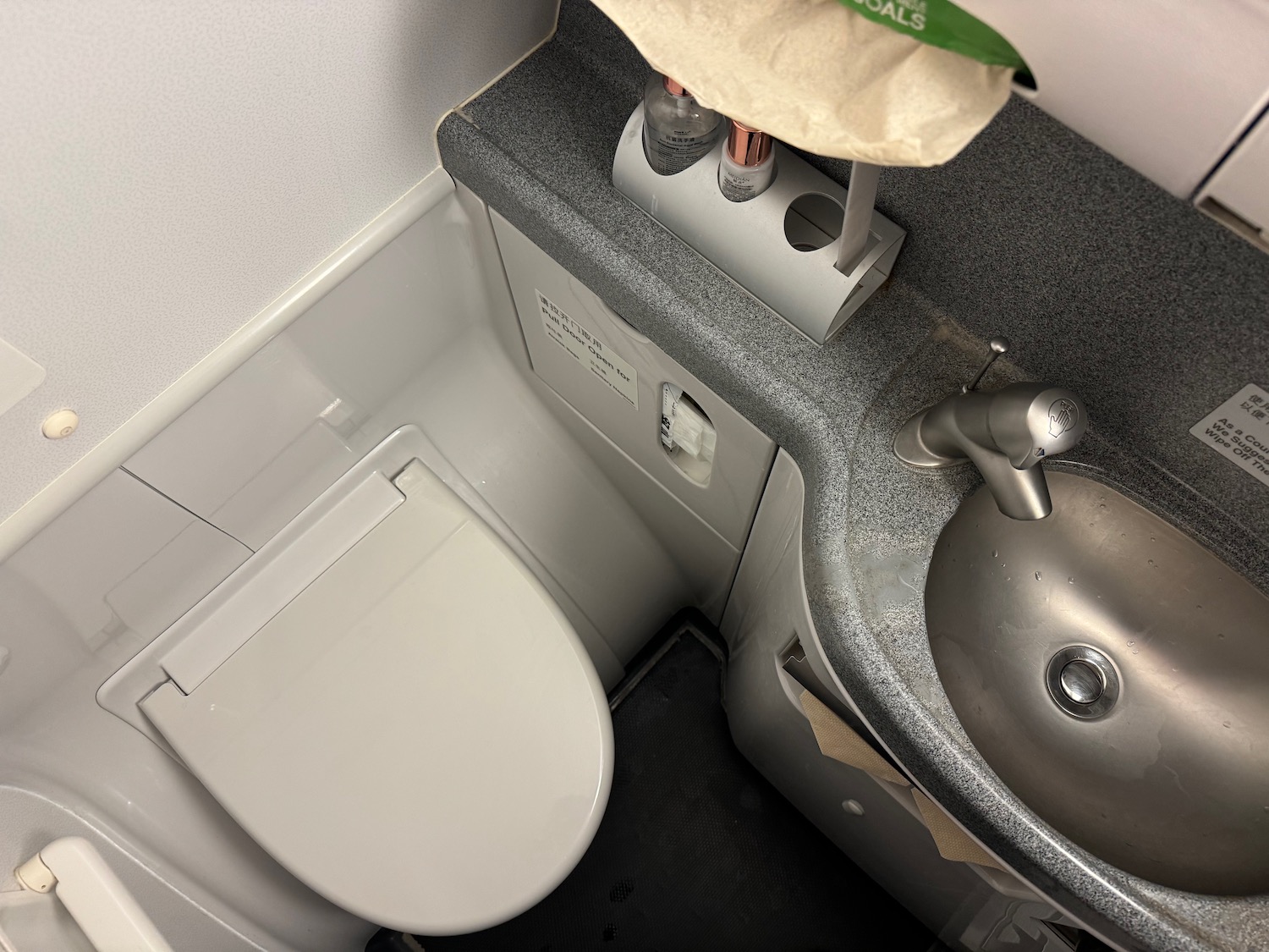 a sink and toilet in a bathroom