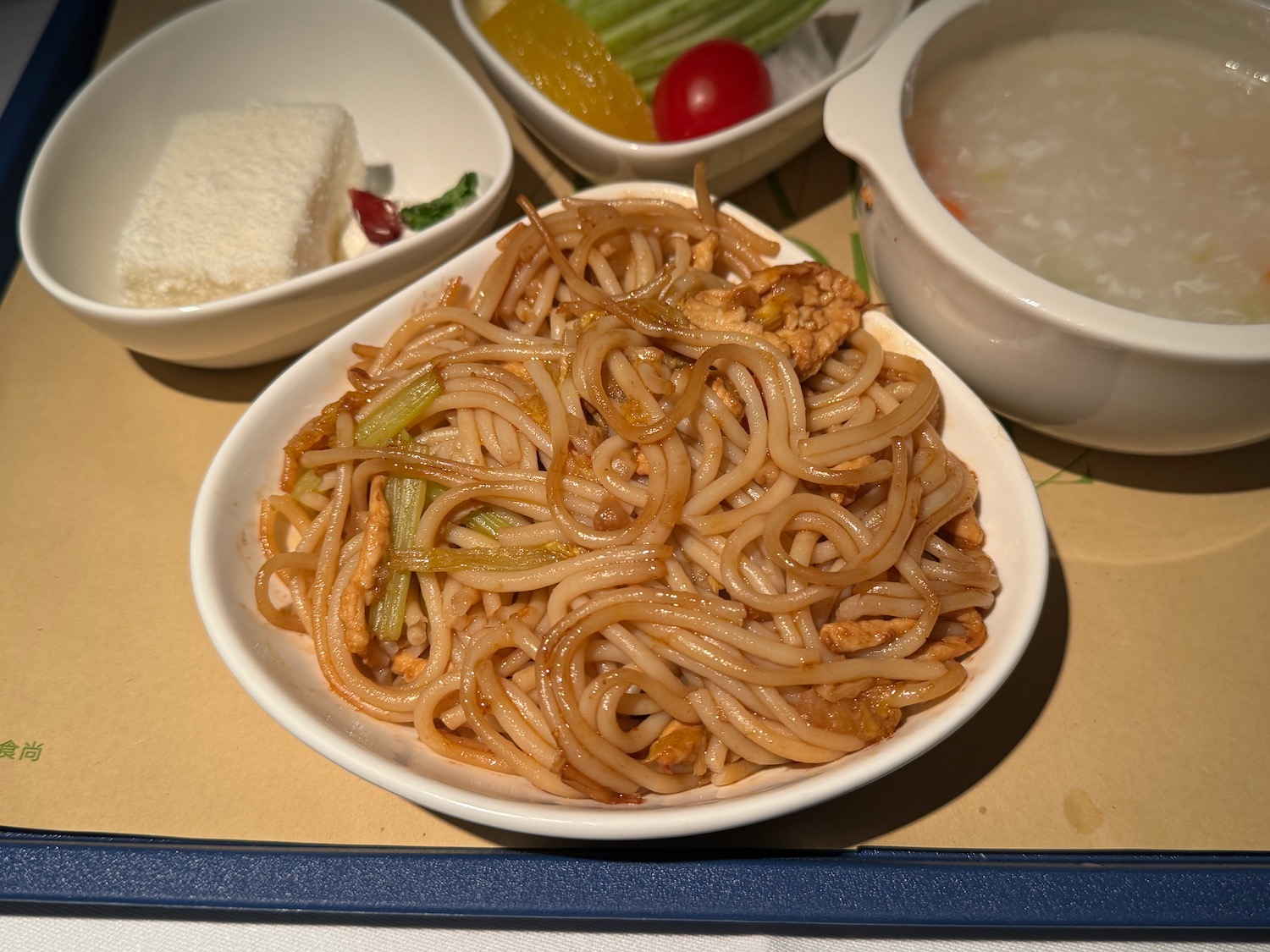 a bowl of noodles and vegetables