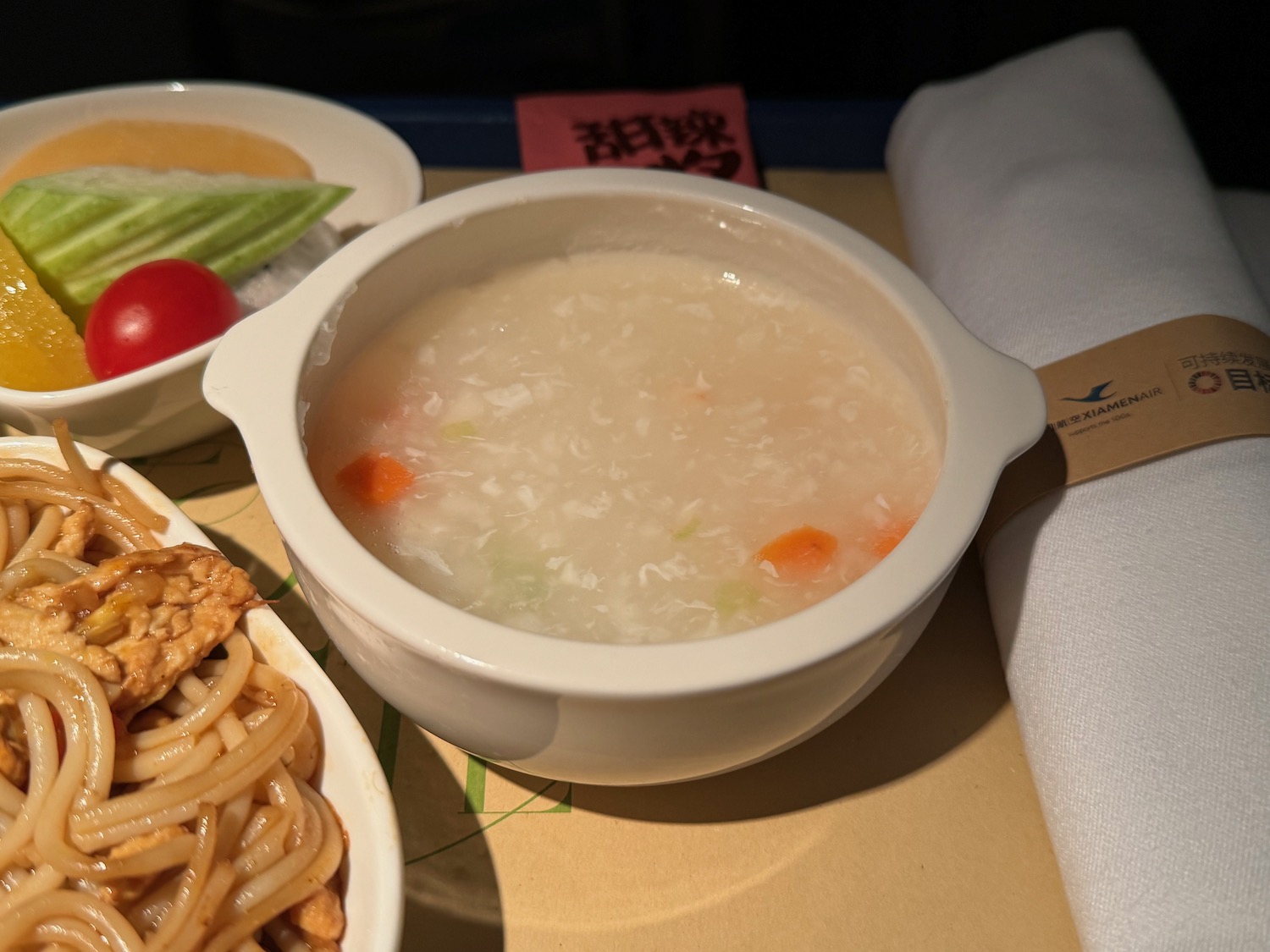 a bowl of soup and noodles