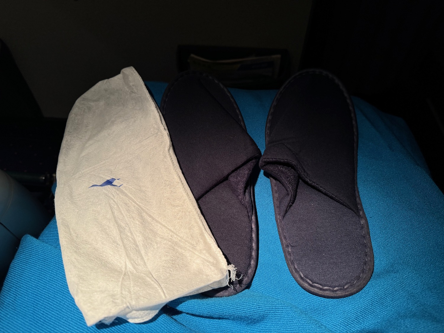 a pair of slippers and a towel