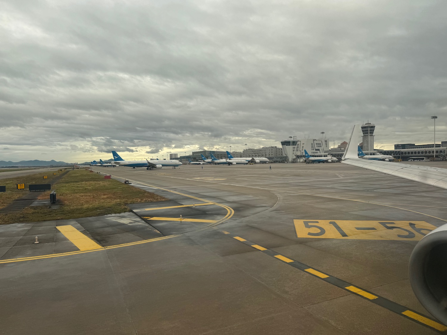 a runway with airplanes on it