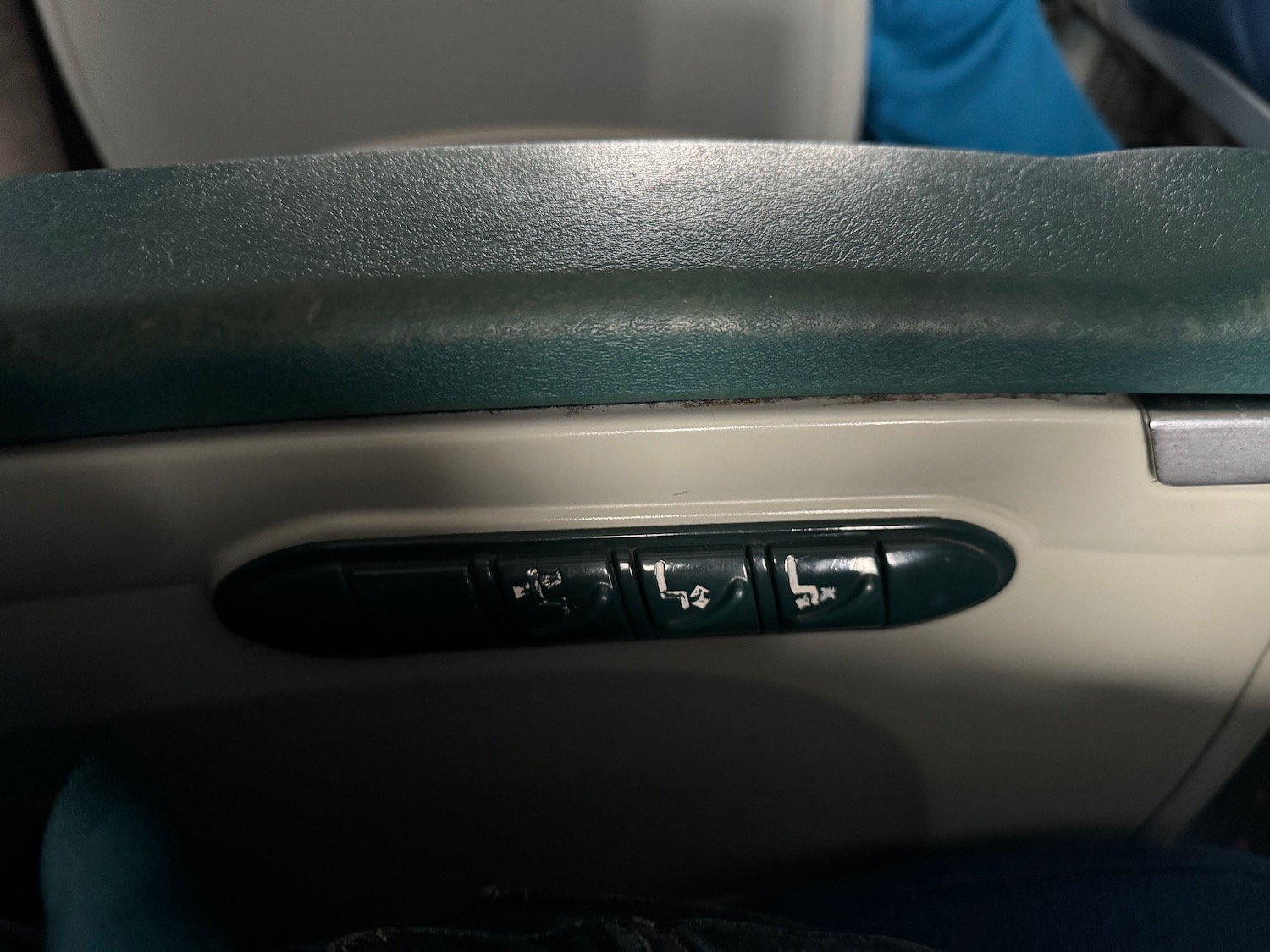 a seat with buttons on the side