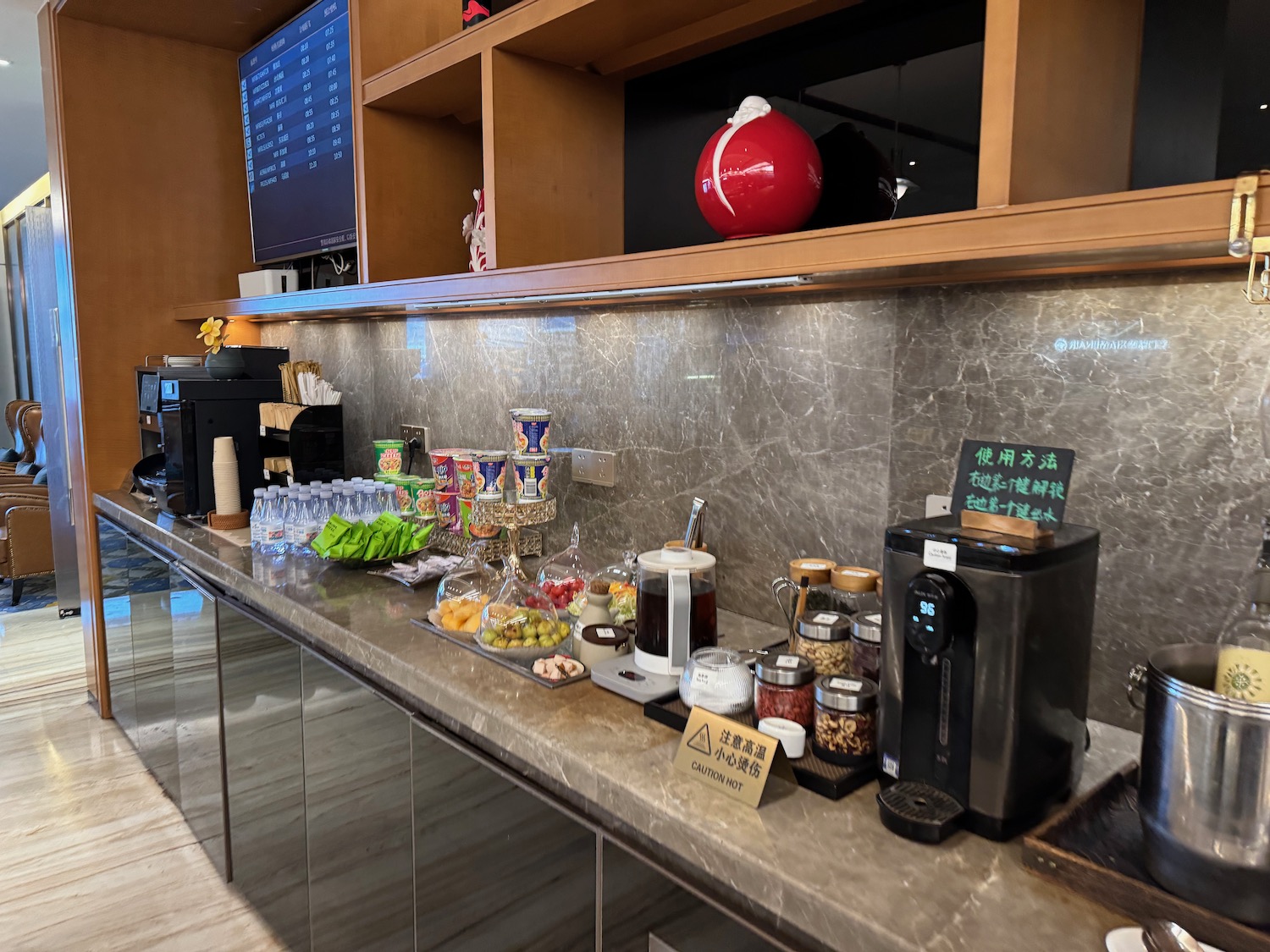 a counter with food and drinks on it