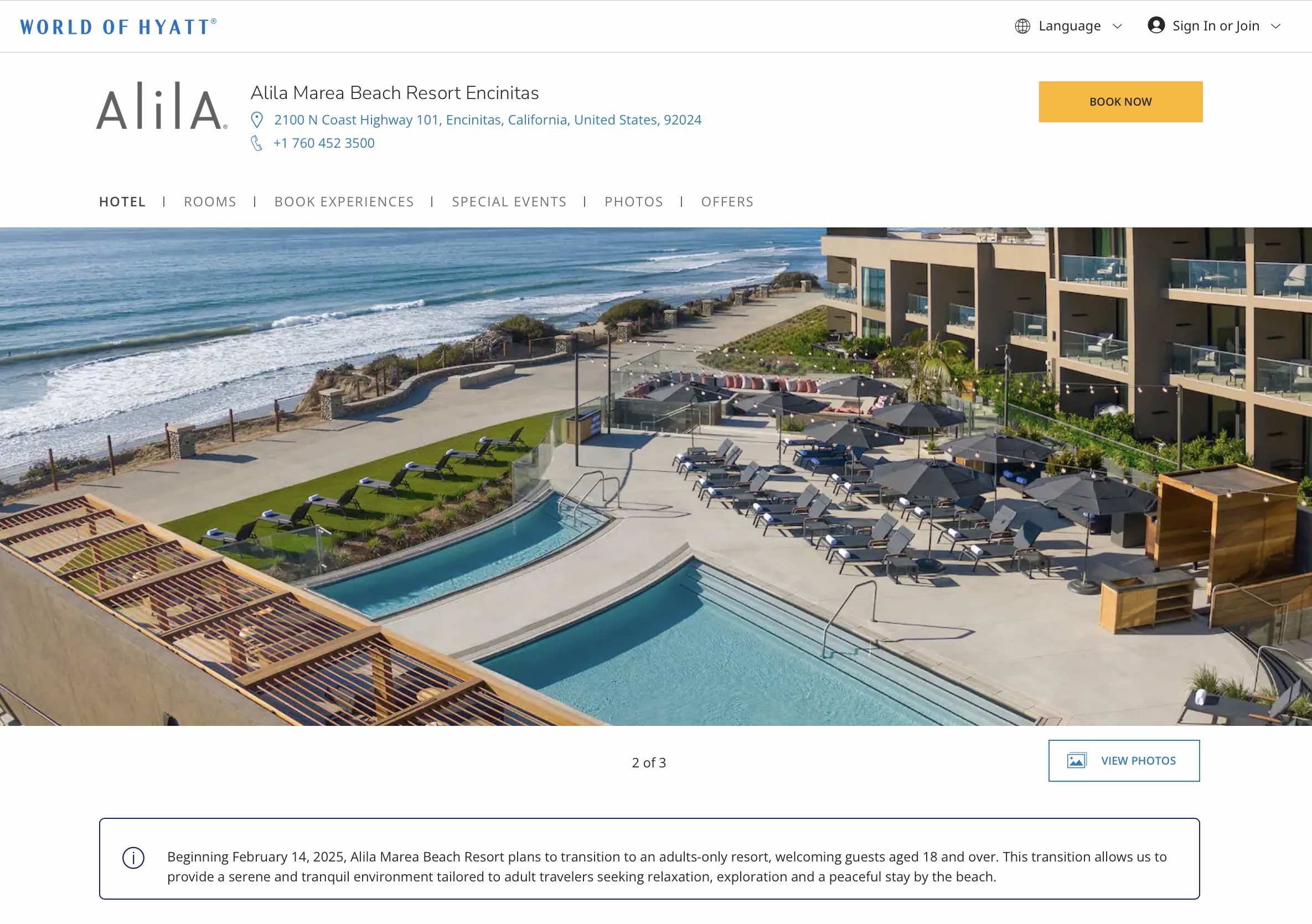 a pool and chairs on a beach