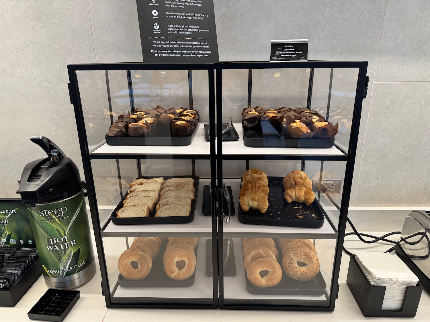 a display case with pastries on it