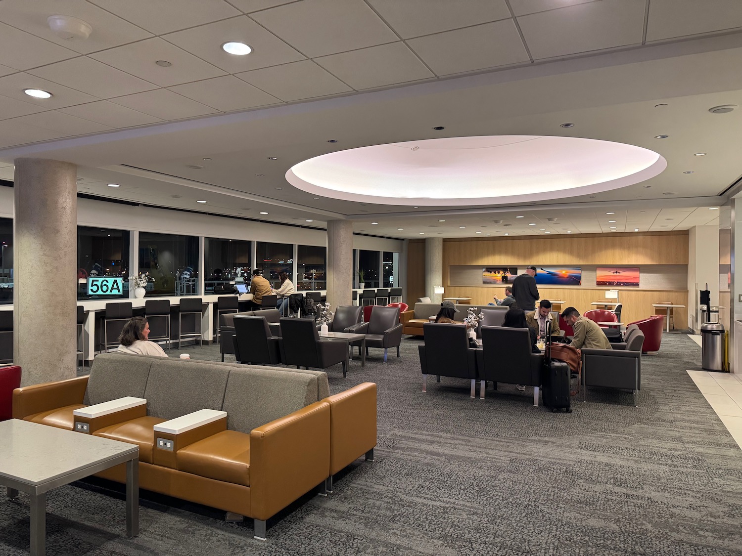 a group of people sitting in a lounge area