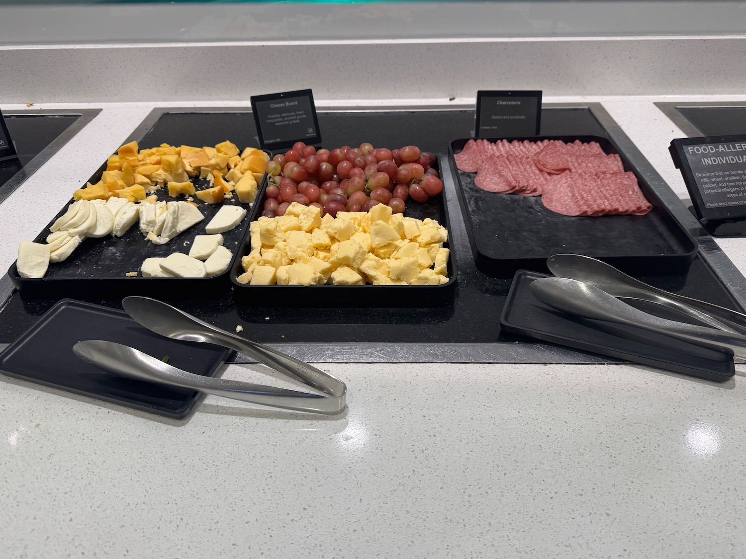 a trays of food on a counter