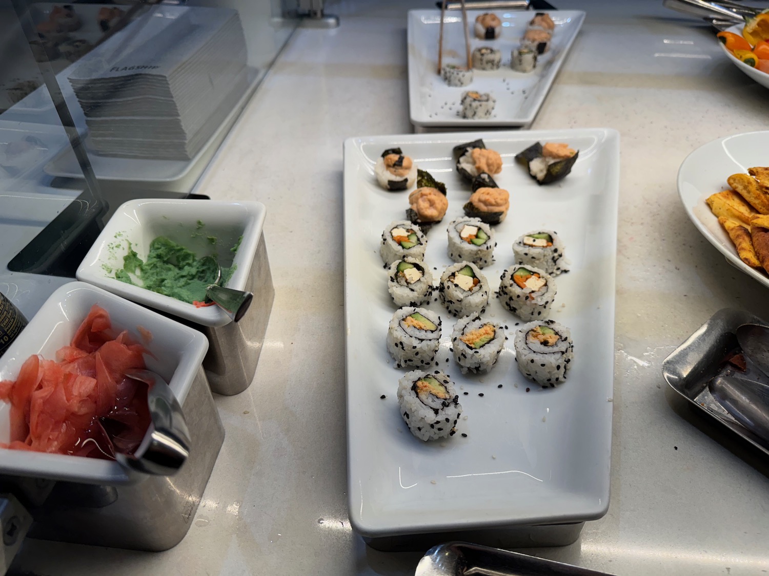 a plate of sushi on a counter