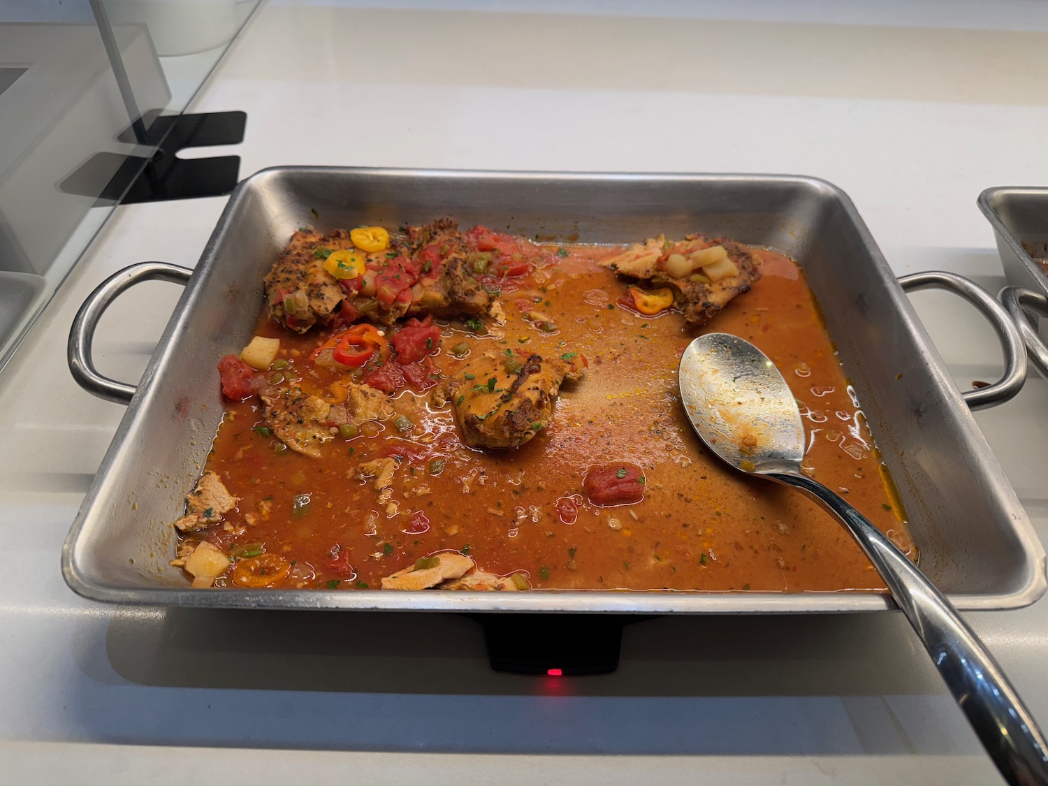 a pan of food with a spoon