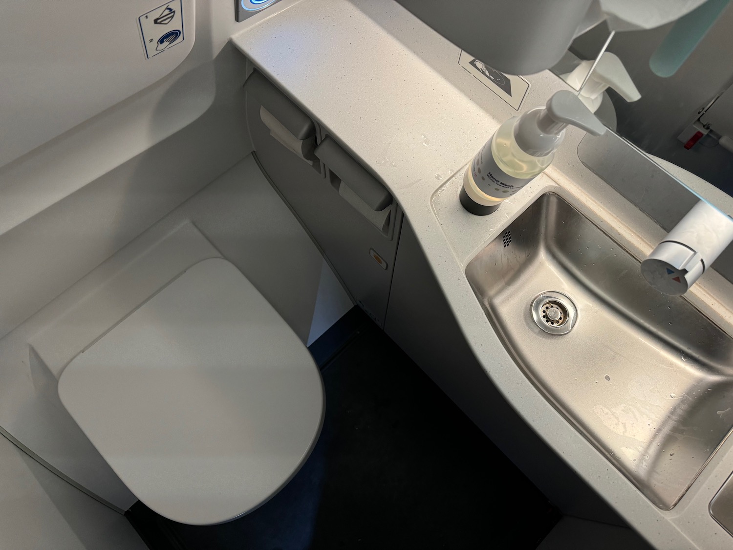 a sink and toilet in a plane