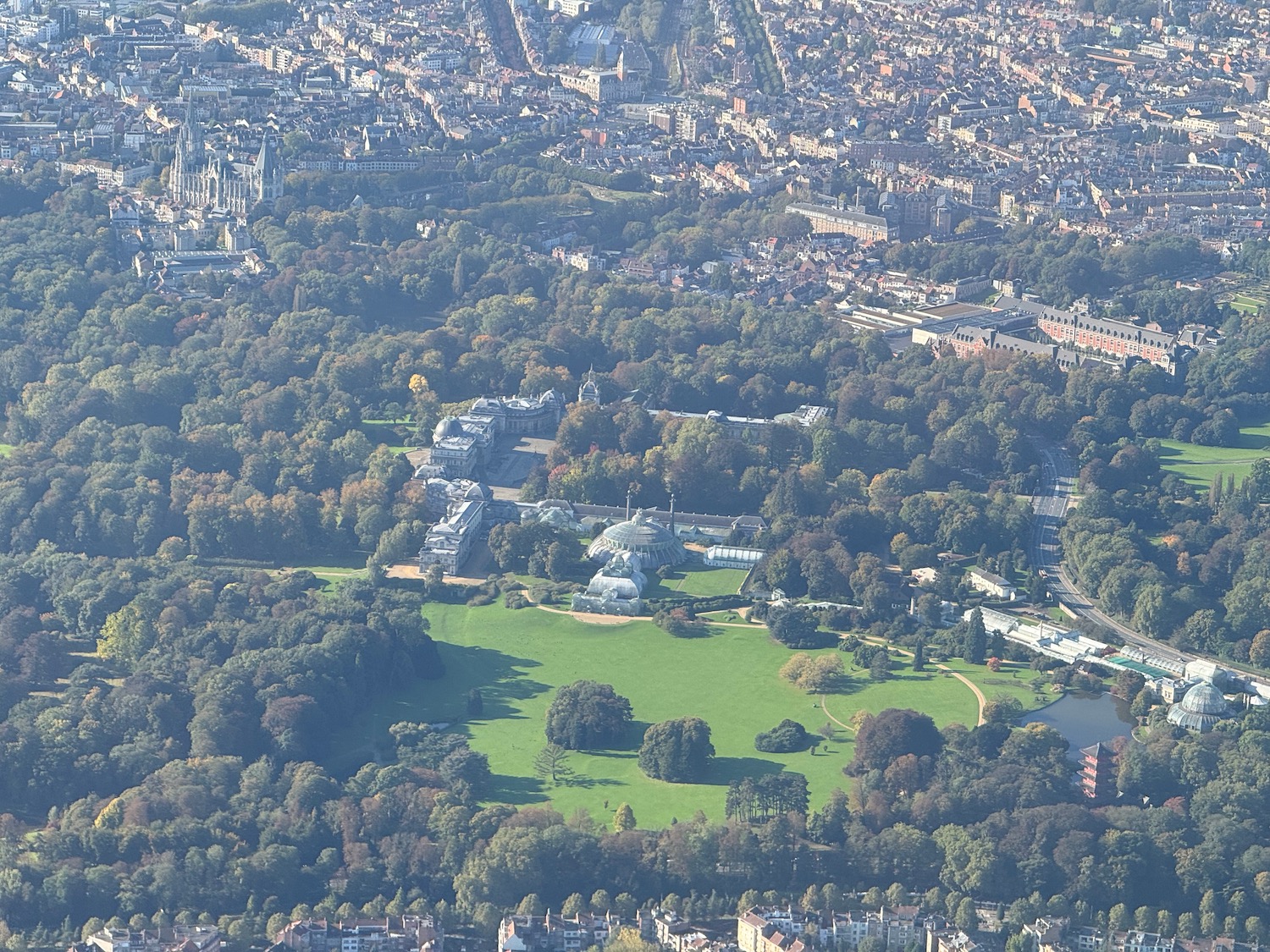 an aerial view of a park and a city