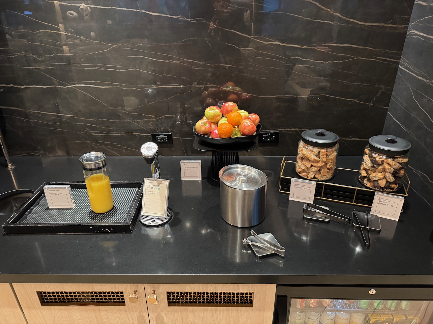 a counter with food and drinks on it