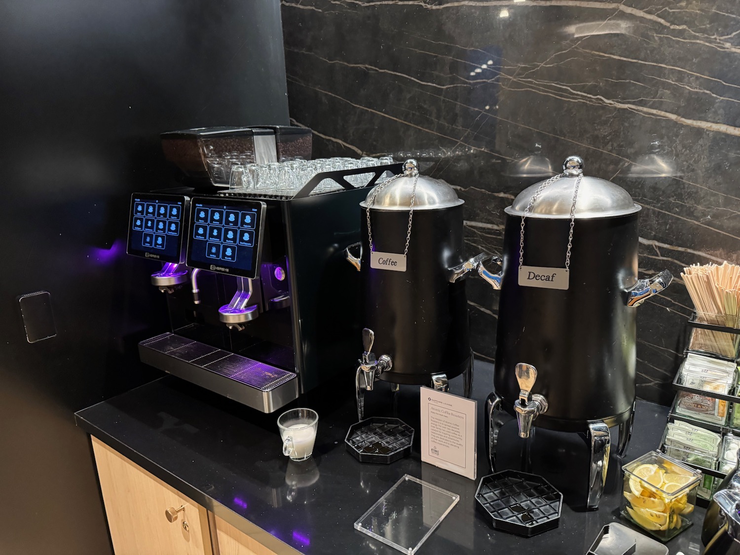 a group of coffee machines on a counter