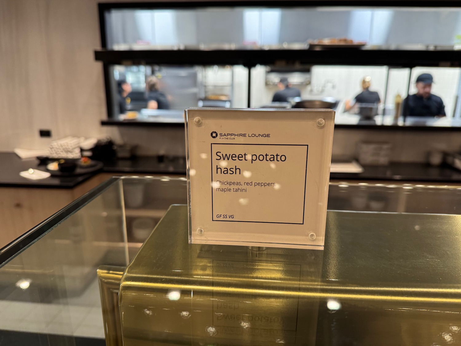 a sign on a glass case