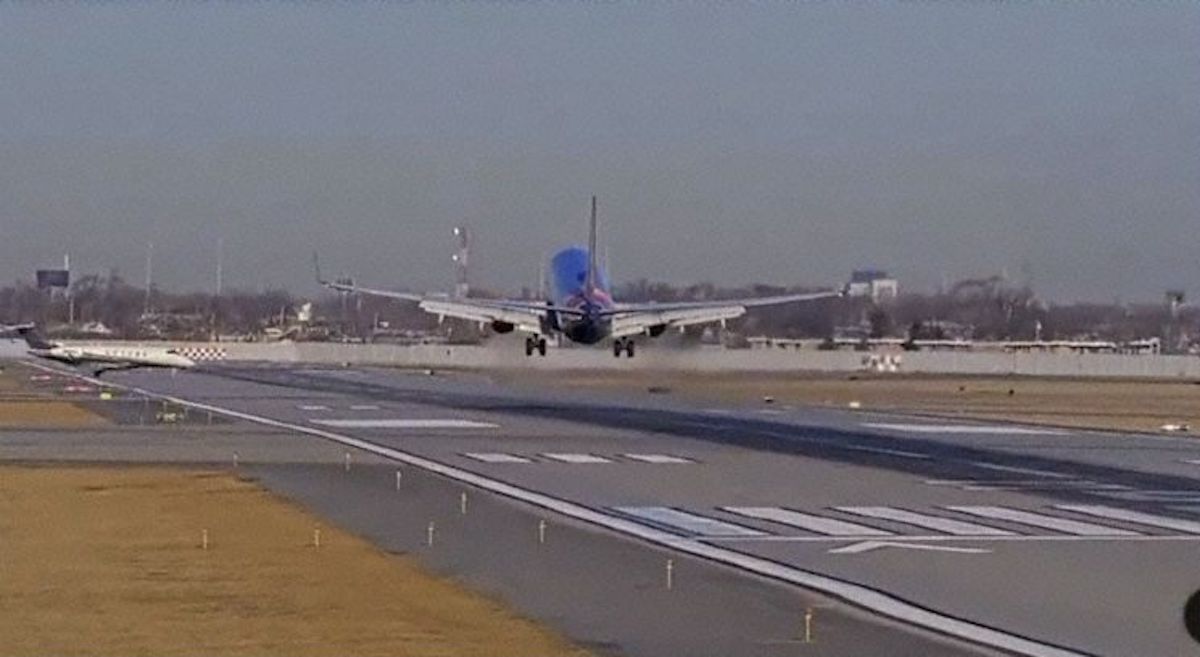 a plane taking off from a runway