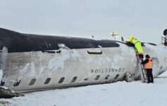 a group of people climbing on a plane