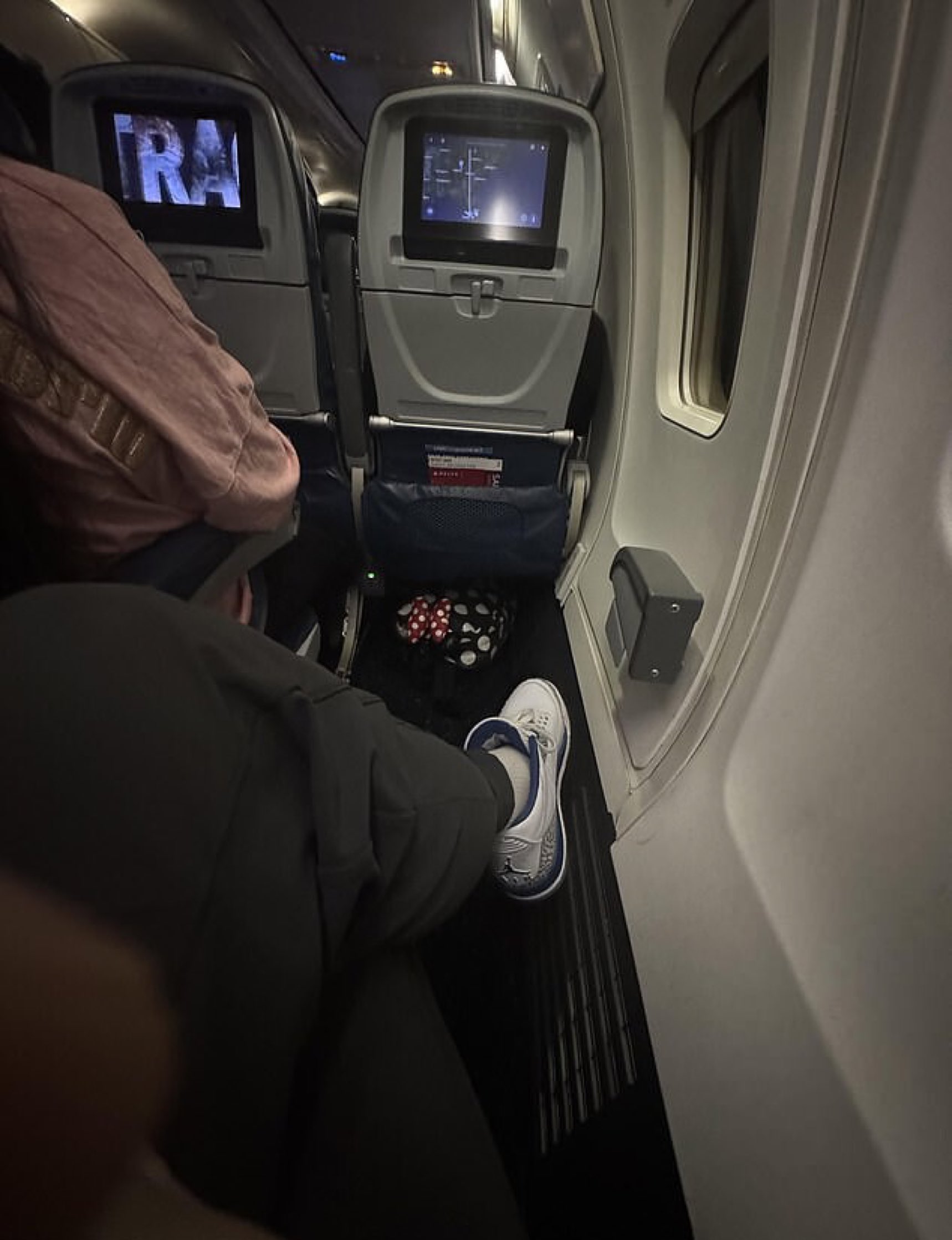 a person sitting on an airplane