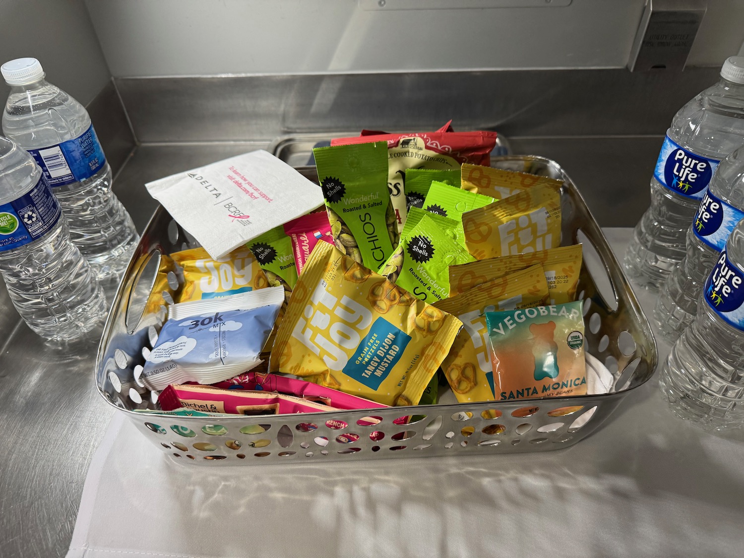 a metal basket with food in it