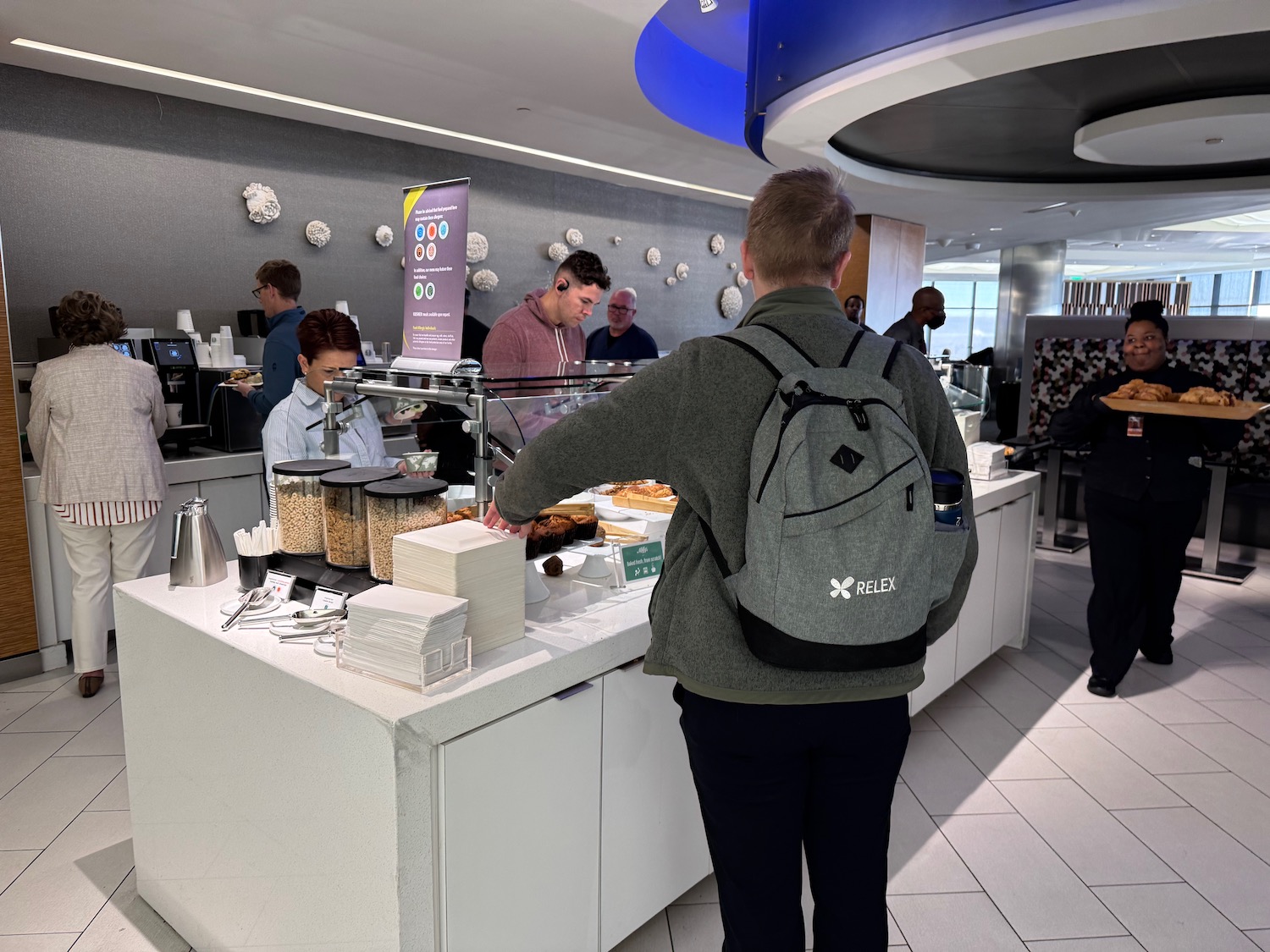 a group of people in a cafeteria