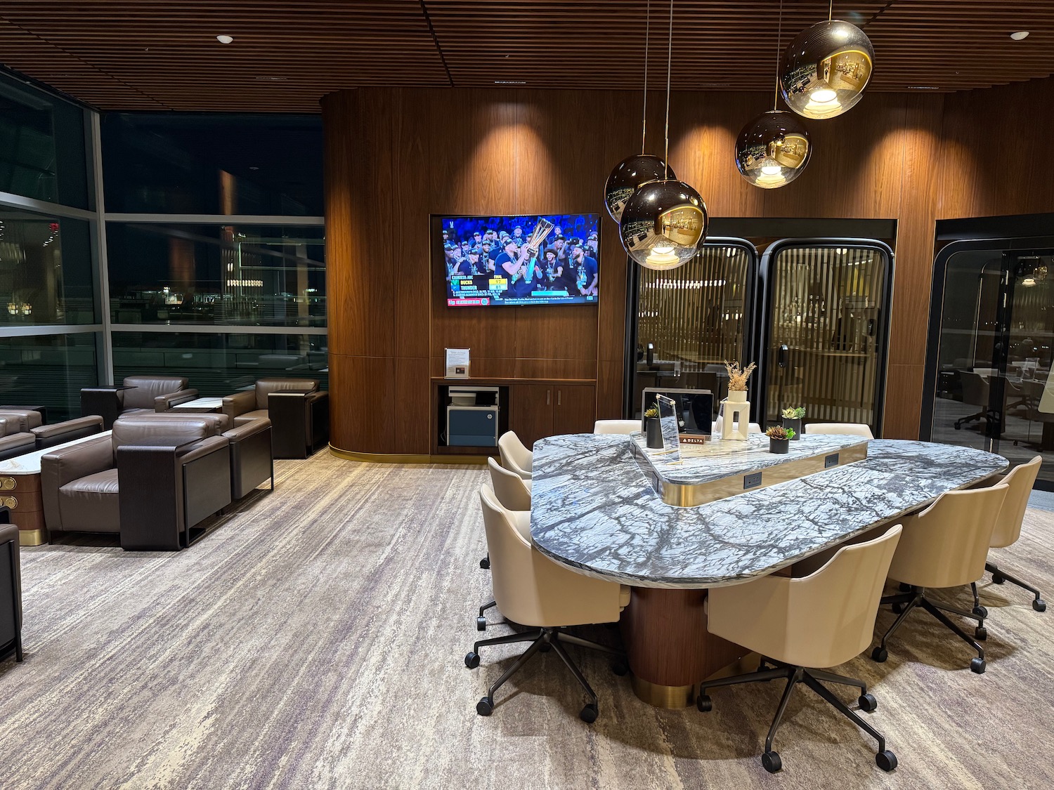 a conference room with a table and chairs