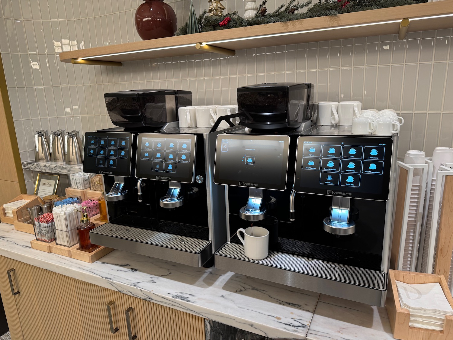 a group of coffee machines on a counter