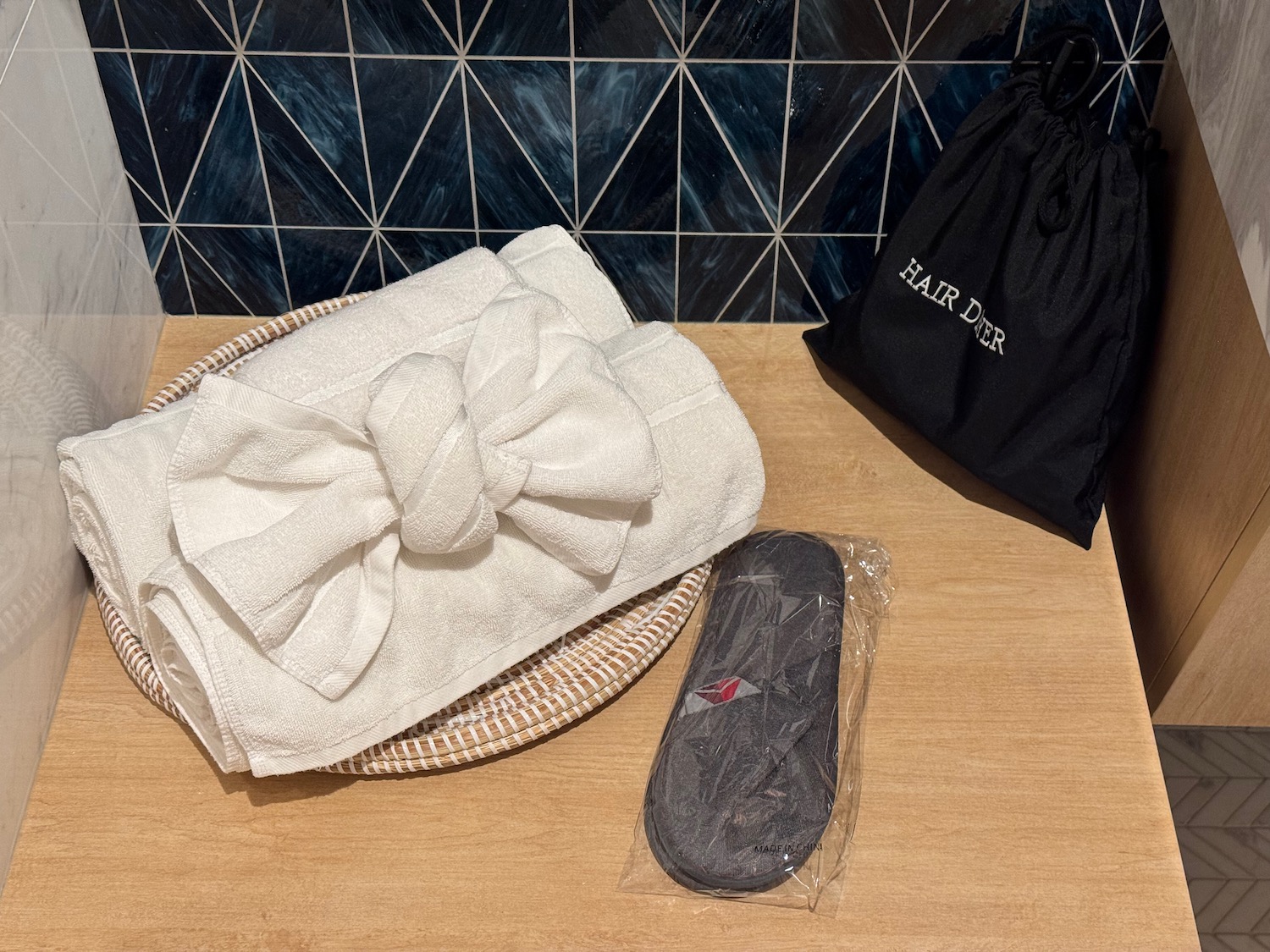 a towel and slippers on a table