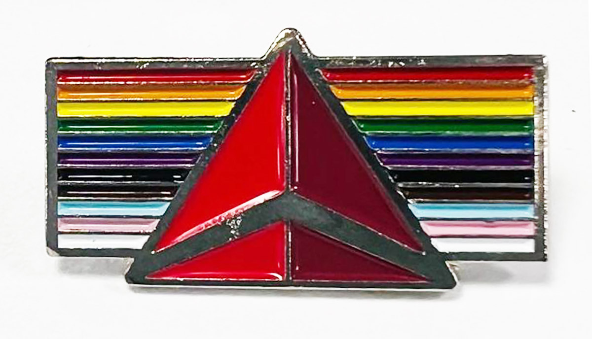 a colorful triangle with a rainbow flag