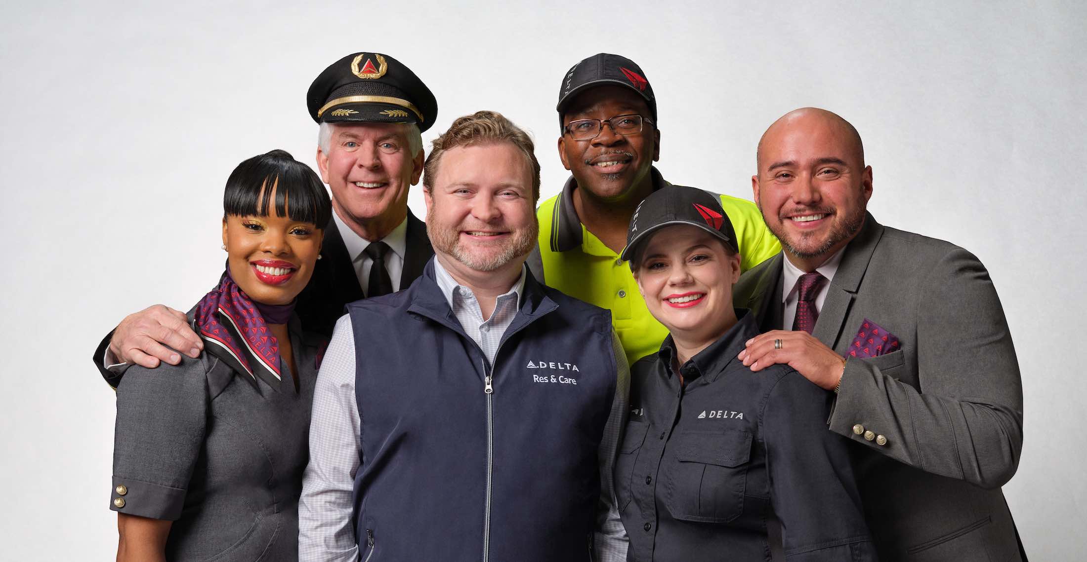 a group of people posing for a photo