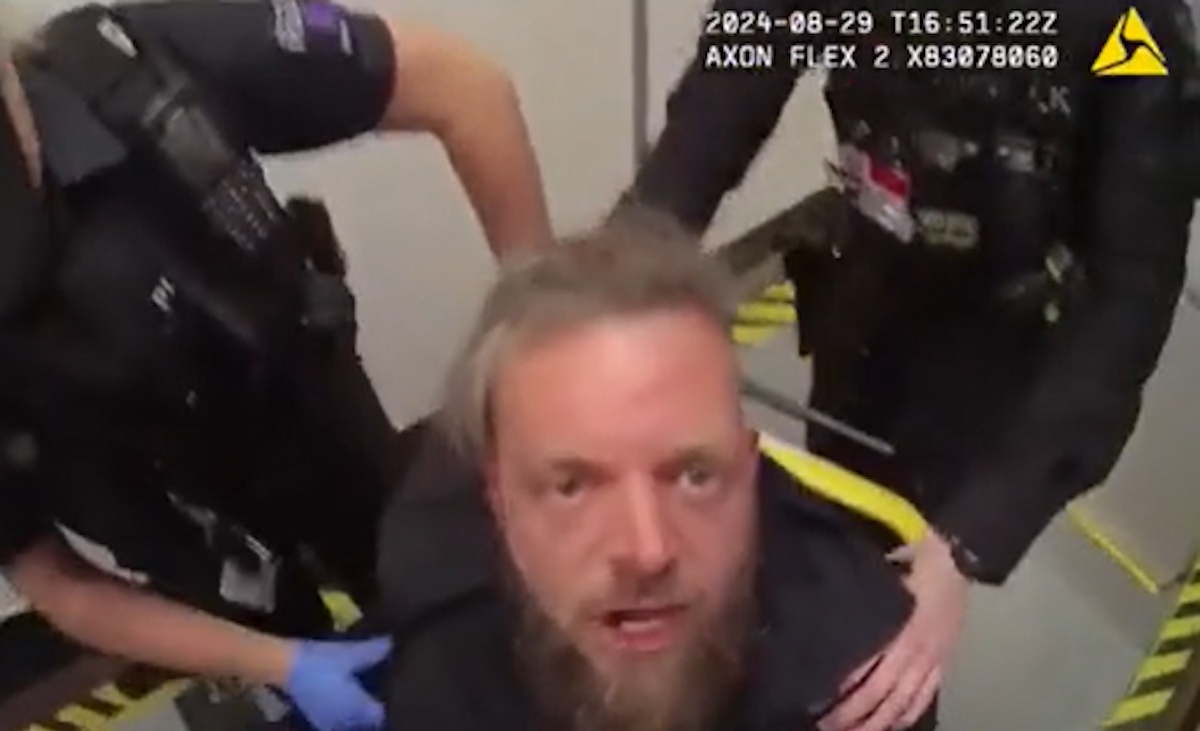 a man with a beard and a police officer