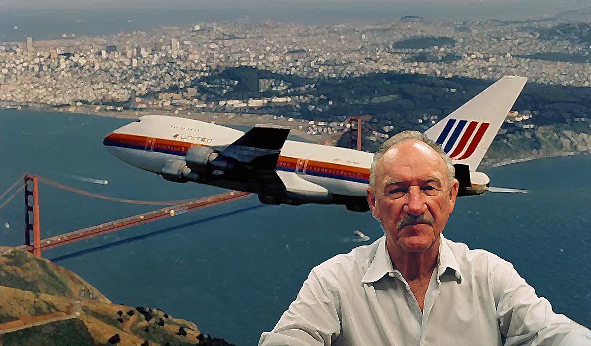 a man taking a selfie with a plane flying over the water