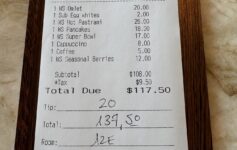 a receipt with black writing on it